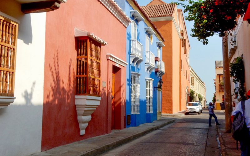 a-street-with-colorful-colonial-buildings-in-the-h-2022-11-16-17-53-31-utc